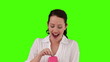 Brunette woman very happy to receive a gift