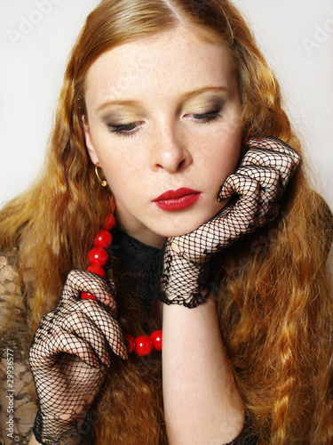 Photo: portrait of then beautiful girl with red beads portrait of then beautiful girl with red beads