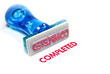 completed blue rubber stamp