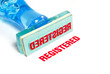 registered blue rubber stamp