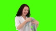 Brunette woman buying clothes