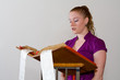 Young Caucasian Woman Reading Bible Church Pulpit