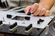 Hand of a dj adjusting the crossfader Hand of a dj adjusting the crossfader