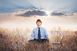 Businessman meditating in lotus pose. Business yoga Businessman meditating in lotus pose. Business yoga