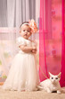 Baby girl with the cat
