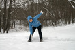 woman carries forward the slopes