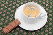 the cup of coffee on the table