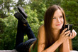 Woman in Park with Coffee