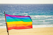 gay flag at the beach