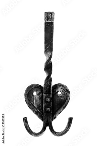 Photo: Old fashioned metal hanger isolated on white Old fashioned metal hanger isolated on white