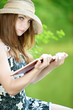 young woman in  a hat