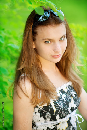 Photo: beautiful young woman in sunglasses beautiful young woman in sunglasses
