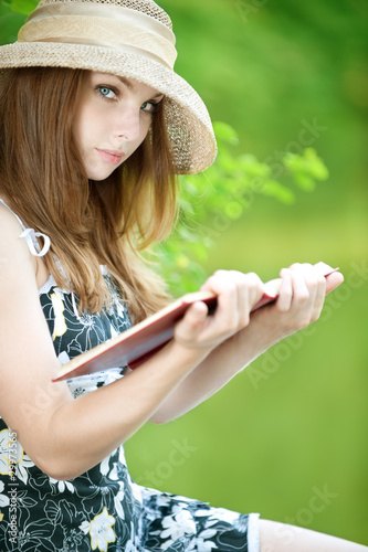 Photo: young woman in a hat young woman in a hat