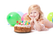 Little girl with birthday cake