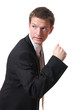 Photo: scared businessman pursued looking back isolated scared businessman pursued looking back isolated
