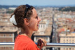 beautiful young woman looks at Rome from Altar of Fatherland