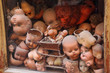 old showcase with many old heads dolls, red doll hair old showcase with many old heads dolls, red doll hair