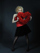 Pretty seductive woman with red heart
