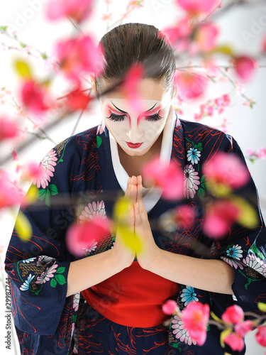 Photo: Artistic portrait of japan geisha woman with creative make-up ne Artistic portrait of japan geisha woman with creative make-up ne