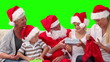 Santa Claus giving gift to a family