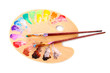 wooden art palette with blobs of paint and a brush on white back wooden art palette with blobs of paint and a brush on white back