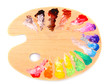 wooden art palette with blobs of paint and a brush on white back wooden art palette with blobs of paint and a brush on white back