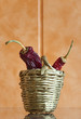 Dried chili peppers in a wicker basket Dried chili peppers in a wicker basket
