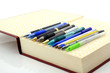 pens and book