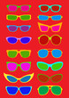 Glasses and Sunglasses on red background