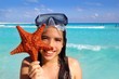 Photo : latin tourist girl holding starfish tropical beach latin tourist girl holding starfish tropical beach