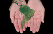 Painted Map Of South America In Our Hands