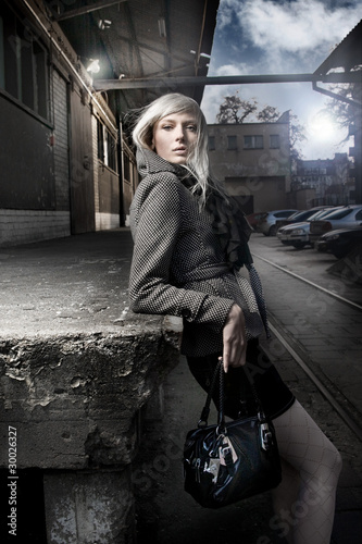 Photo: beautiful fashionable woman on the street beautiful fashionable woman on the street
