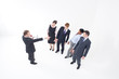 Photo: Manager talking to businesspeople with megaphone Manager talking to businesspeople with megaphone