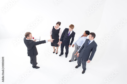 Photo: Manager talking to businesspeople with megaphone Manager talking to businesspeople with megaphone