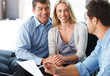 Expert advice - Smiling young couple listening to male consultan
