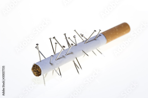 Photo : Voodoo cigarette, or is this acupuncture? Voodoo cigarette, or is this acupuncture?