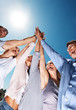 Joyful business people together celebrating their success