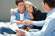 Happy young couple shaking hand with agent Happy young couple shaking hand with agent