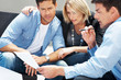 Investment concept - Young couple getting financial advice