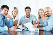 Happy business colleague in a board meeting