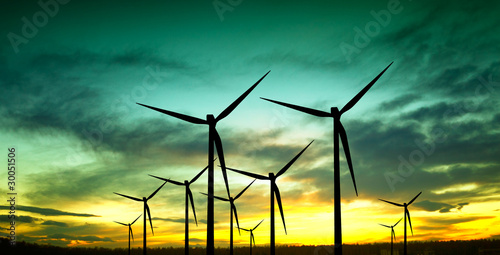 Photo: Wind turbines silhouette at sunset Wind turbines silhouette at sunset