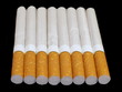 Smoking cigarettes isolated on black background