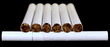 Smoking cigarettes isolated on black background