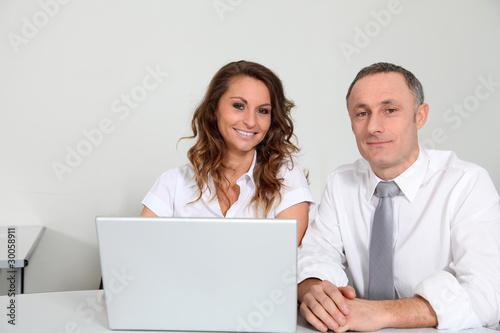Photo: Business team working in the office Business team working in the office