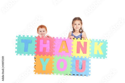 Photo: Kids holding thankyou sign Kids holding thankyou sign