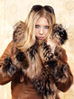 Blond woman with fur coat