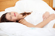 Young woman stroking her belly Young woman stroking her belly