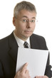 Businessman pointing at blank document