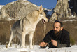 Man and his Czechoslovakian wolf dog