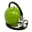 Stethoskop mit Apfel